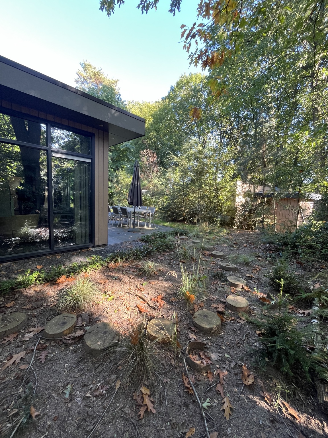 Bosverblijf De Luwte met terras en bomen